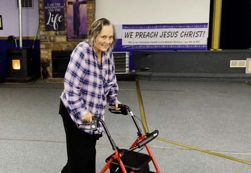 Tamra walks with walker aid into Sanctuary at Jesus is Lord Ministries, Biglerville, PA -YAHWEH MIRACULOUSLY HEALED ME - Preaching - Heavens View Ministry - Where the Spirit of the Lord is