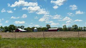 Heavens View Ministry - Divine Appointments - Farmstead with Blue Sky Puffy Clouds - INDIANA - Where the Spirit of the Lord is.