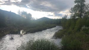 Heavens View Ministry - Divine Appointments - River through Green Hills Sun through Clouds - MONTANA - Where the Spirit of the Lord is.