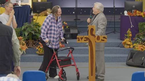 Tamra walks with walker aid up to pulpit to provide testimony in Sanctuary at Jesus is Lord Ministries, Biglerville, PA, with Preacher Mike Yeager -YAHWEH MIRACULOUSLY HEALED ME - Preaching - Heavens View Ministry - Where the Spirit of the Lord is